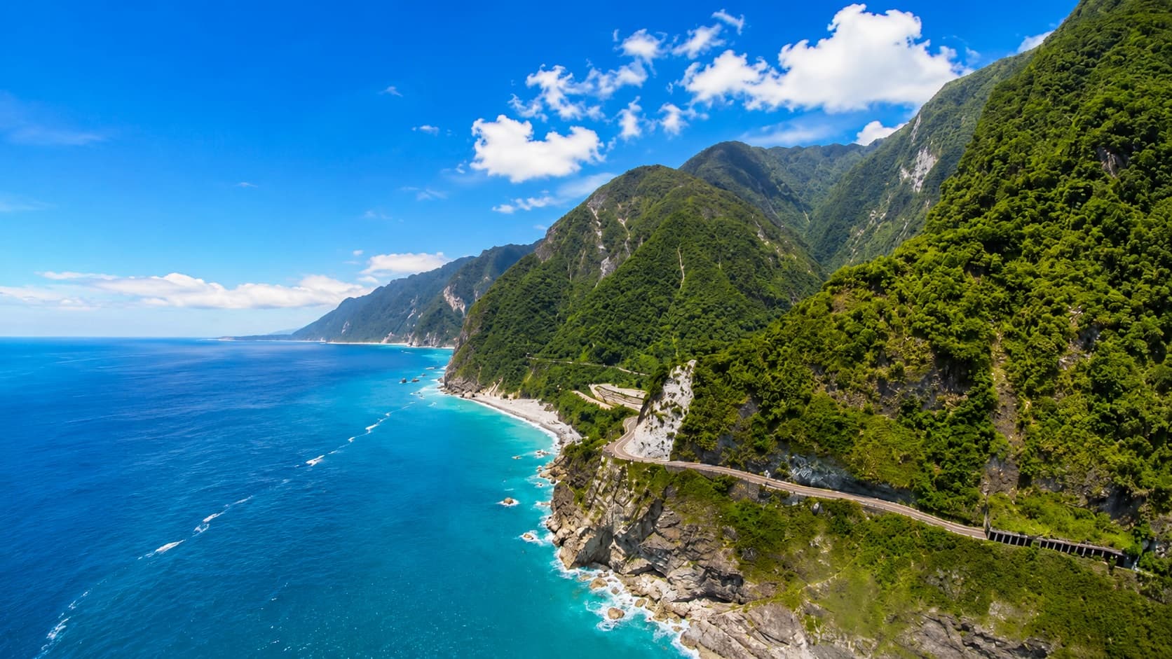 Qingshui Cliff beside a bright blue sea